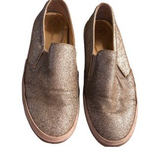 Micheal Kors size 10 silver metallic coated canvas slip on sneaker or boat shoe